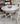 Brooke 48" Single Pedestal Dining Table with (4) Brook Side Chairs